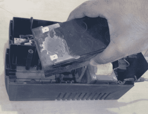 Take out the battery from UPS